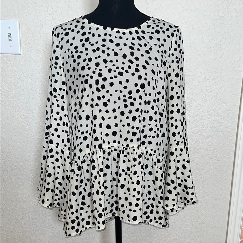 Polka Dot baby doll top. Ruffled long sleeve. Ruffled swing hem. Blk & cream.